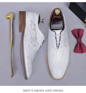 Detailed macro view of white leather derby shoes with elegant scritio script pattern