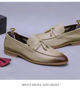 Detail of men's leather tassel loafers with vintage gradient finish and premium texture