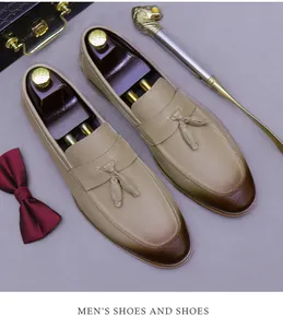 Men's leather tassel loafers featuring a dual-tone gradient finish and classic fringe detail