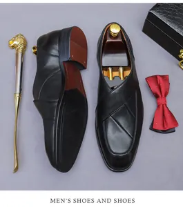 Top view of men's leather business shoes with elegant cross pleats and non-slip sole