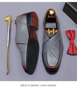 Top view of men's leather business shoes with grey-brown gradient and cross-overlap design
