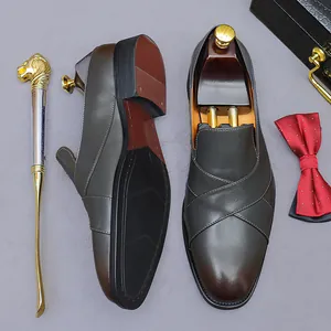 Classic leather loafers for men with gradient finish and elegant cross-strap design