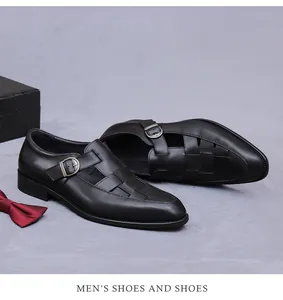 Detail of black leather monk strap shoe with woven texture, gift box and bowtie