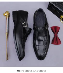 Macro view of woven black leather formal monk strap shoes with metallic buckle detail