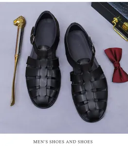 Detail of men's black leather Roman sandals with woven straps and metal buckle
