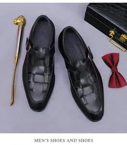 Detail of premium black leather woven texture and metallic buckle on men's casual dress shoe