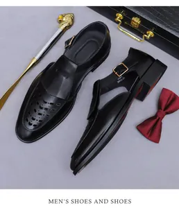 Detail view of black leather hollowed-out sandals with metal buckle and premium texture