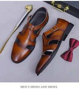 Detail of brown leather hollow-out dress shoes with buckle and vintage burnished toe