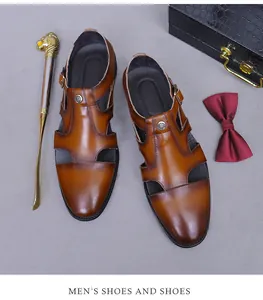 Brown gradient leather oxford shoe with side cutouts, metal buckle and business accessories