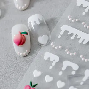 3D embossed nail art stickers with white drips, hearts and pink peach ornaments