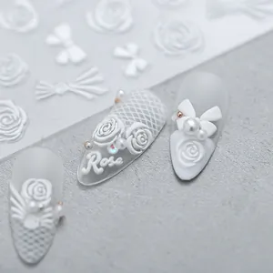 Elegant 5D embossed white rose and bow nail art stickers with textured pearl finish