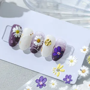 5D daisy nail stickers featuring purple floral patterns and gold 3D decorative accents