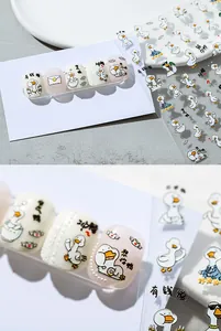Close-up of cute cartoon duck nail art stickers with 5D thin and flexible texture