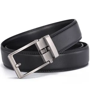 Detailed macro view of black lychee grain leather belt with brushed metal pin buckle