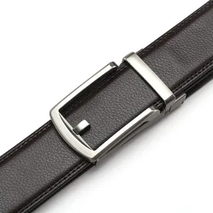 Macro shot of dark brown leather belt texture with matte silver metal pin buckle