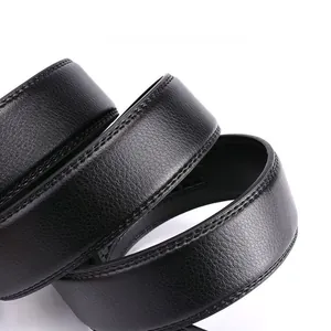 Macro detail of men's leather belt featuring black lychee pattern and neat double stitching