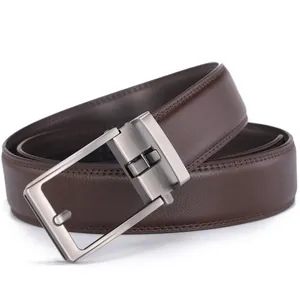 Close-up of men's dark brown leather belt with brushed gunmetal automatic buckle