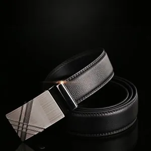 Detail of premium black leather belt with textured alloy automatic buckle for men