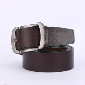 Close-up of a dark brown genuine leather men's belt with a matte grey metal buckle