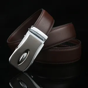 Men's dark brown leather belt with matte silver automatic buckle on black reflective surface