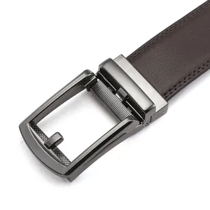 Detail of dark brown leather belt showing stitching and metallic automatic buckle