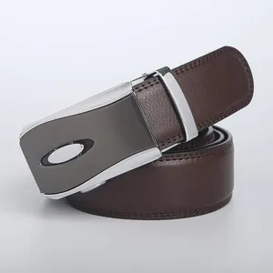Detail of premium brown leather belt with contrast metal automatic buckle and stitching