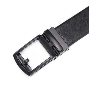 Macro detail of matte black metal automatic buckle and lychee grain leather belt strap