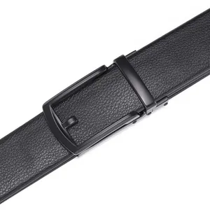 Macro shot of men's black lychee grain leather belt with matte black automatic metal buckle