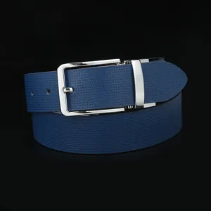 Detailed macro of a dark blue micro-perforated leather belt with a silver metal buckle