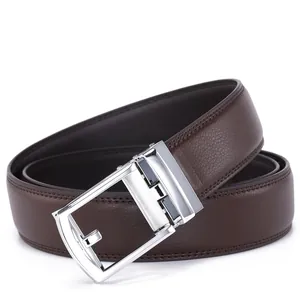 Close-up of brown leather belt with lychee texture and silver automatic metal buckle