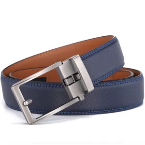 Macro view of blue embossed leather belt with brushed silver automatic buckle