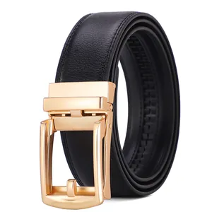 Detailed macro view of the black leather belt texture and the golden metal automatic buckle