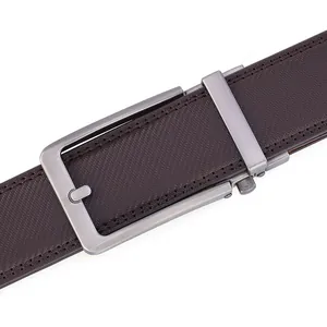Detail of men's leather belt featuring a dark brown chevron texture and matte buckle