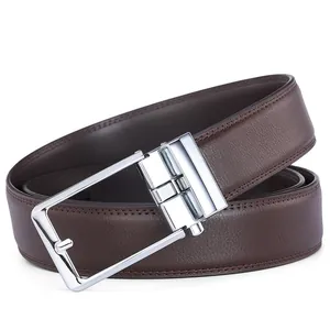 Close-up of men's dark brown leather belt with litchi grain and silver buckle