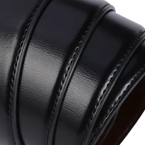 Macro view of black leather belt featuring premium texture and double stitching detail