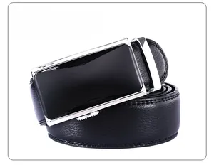 Detail of black leather men's belt with silver alloy automatic buckle and fine stitching