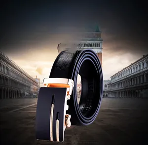 Close-up of black leather belt with automatic alloy buckle and elegant matte gold accents