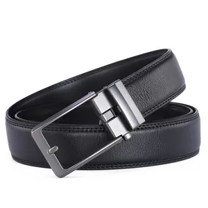 Close-up of black lychee leather belt with dark gray metal buckle and stitching