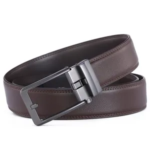 Detail of men's brown lychee leather belt with gunmetal matte buckle and fine stitching
