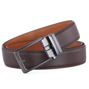 Close-up of brown genuine leather belt with cross pattern texture and gunmetal buckle