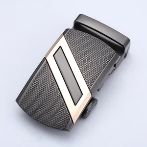Gunmetal men's automatic belt buckle with rose gold trim and textured geometric pattern
