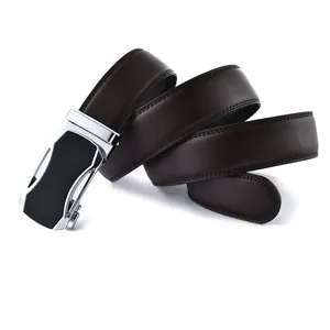 Close-up of brown litchi pattern leather belt with silver automatic metal buckle