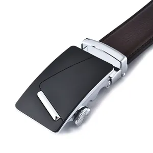 Macro detail of men's leather belt with matte alloy buckle and lychee pattern strap