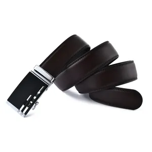Detail of dark brown leather belt with black automatic buckle and silver frame accents