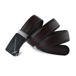 Detail of men's brown leather belt showing lychee texture and metallic automatic buckle