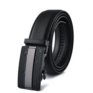 Detail of men's leather belt with black alloy automatic buckle featuring honeycomb texture