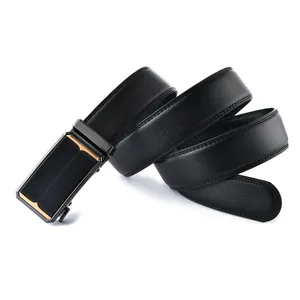 Macro detail of men's leather belt featuring black pebble texture and automatic buckle