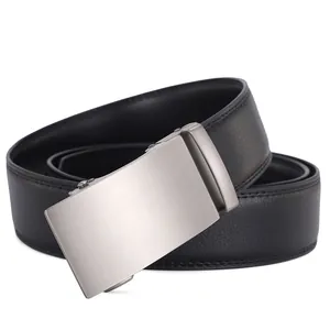Detail of men's leather belt with brushed metal automatic buckle and textured strap