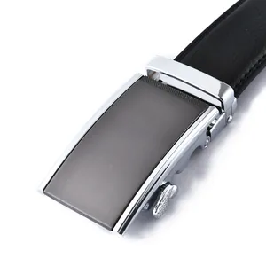 Detail of men's leather belt featuring a silver polished automatic buckle with brushed finish