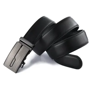 Detail of black leather belt featuring premium litchi texture and silver metal buckle